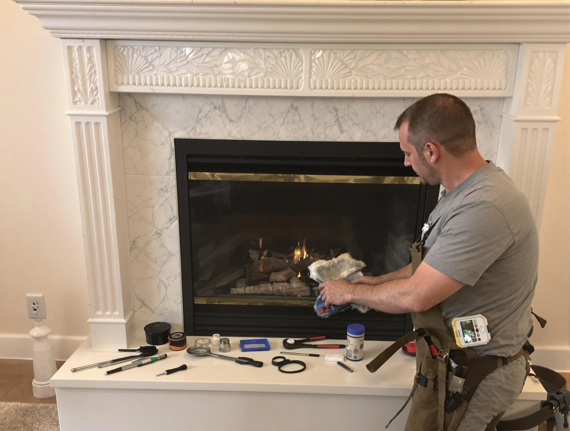 Hapeville Chimney Sweep performing fireplace maintenance in Hapeville, GA